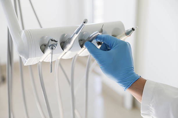 Professional Tooth Extraction technician working in Calcasieu Parish County, LA